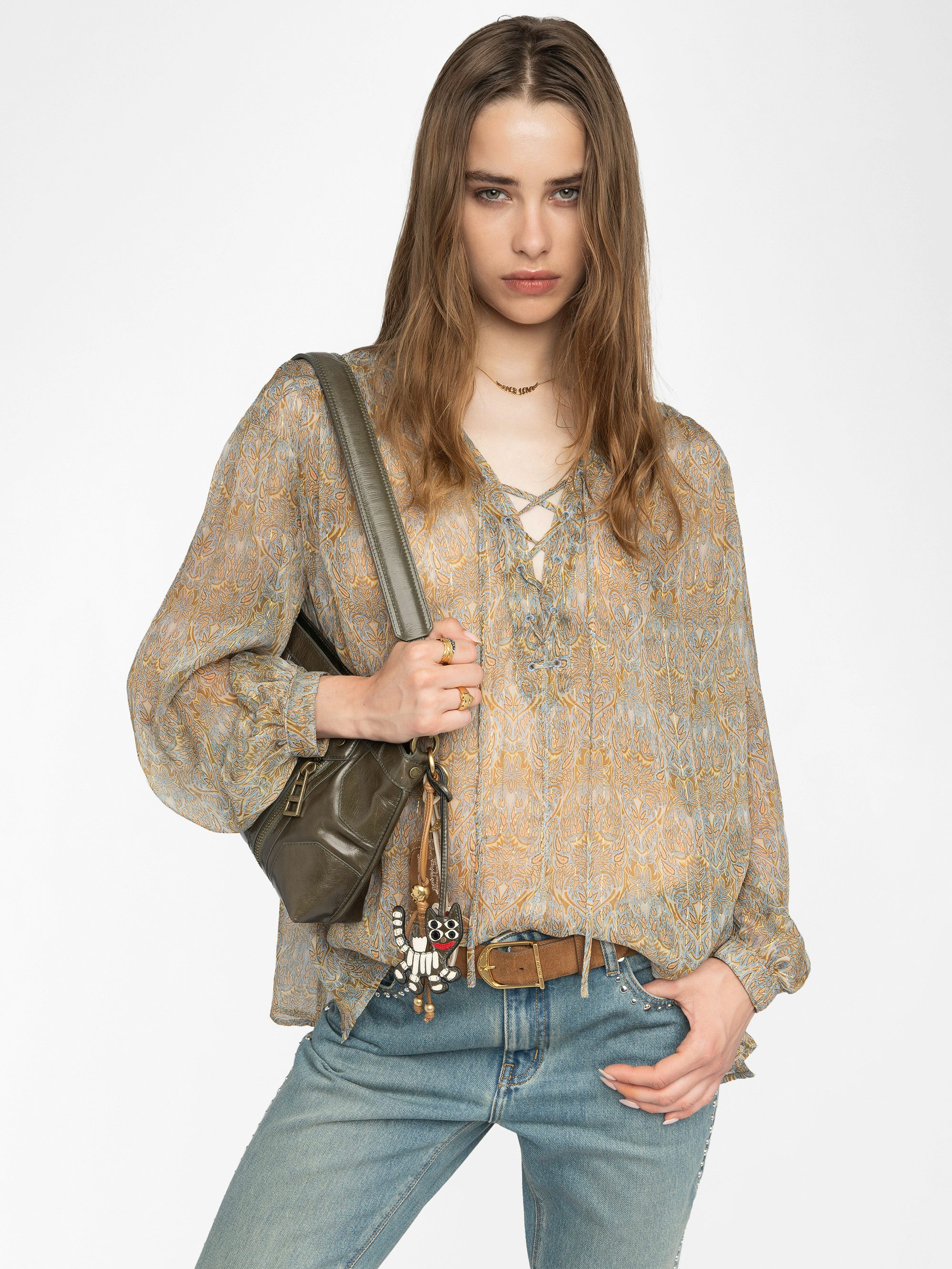 Tamela Shirt - Printed chiffon shirt with golden stripes, long balloon sleeves, western yoke and laced neckline.